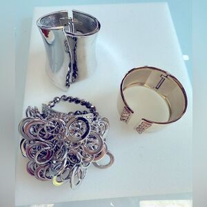 Trio of stunning cuff bracelets one gold Victoria secret's and two silver